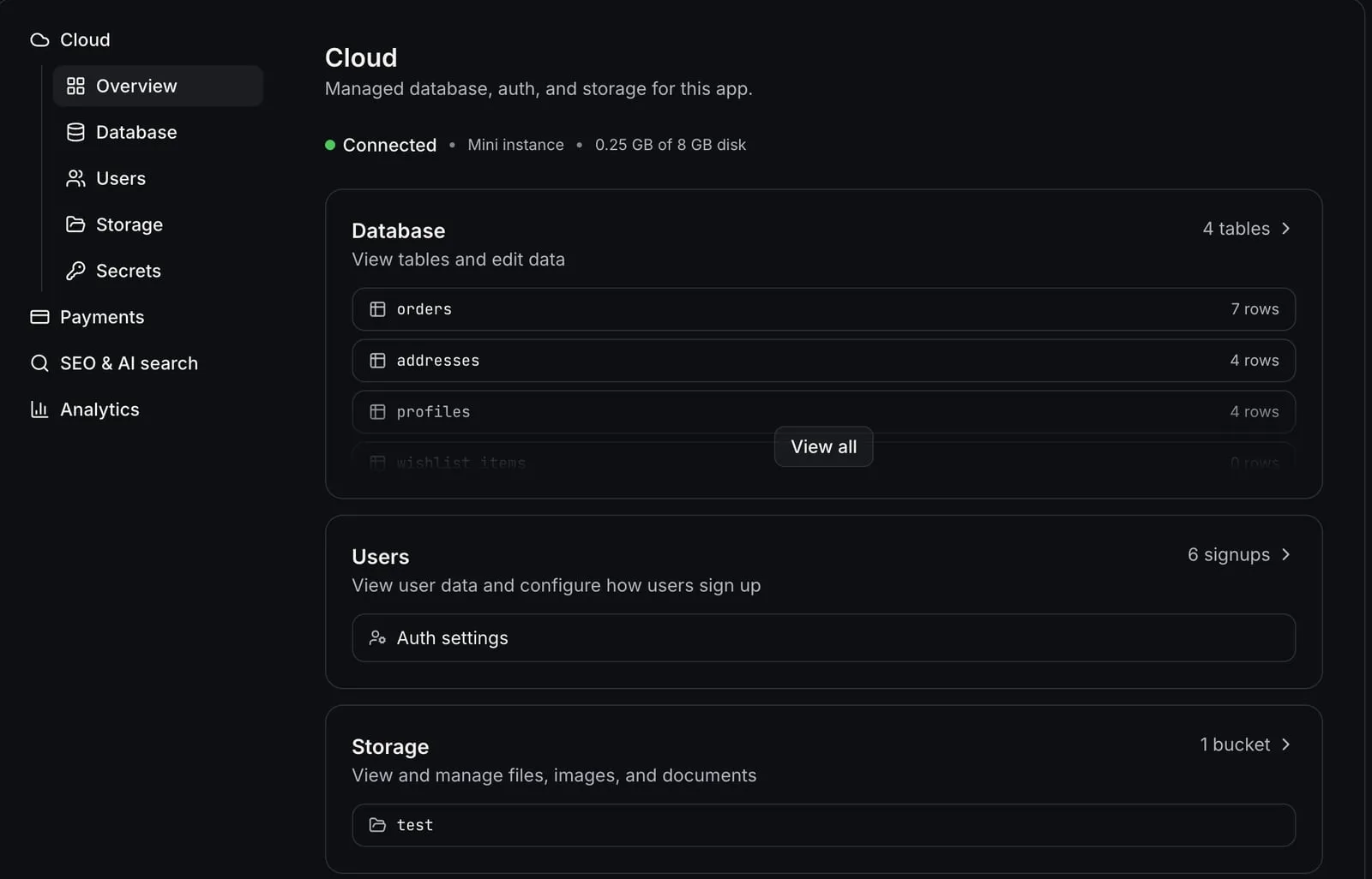 AI Studio Cloud overview showing an app's database tables, user signups, and file storage.