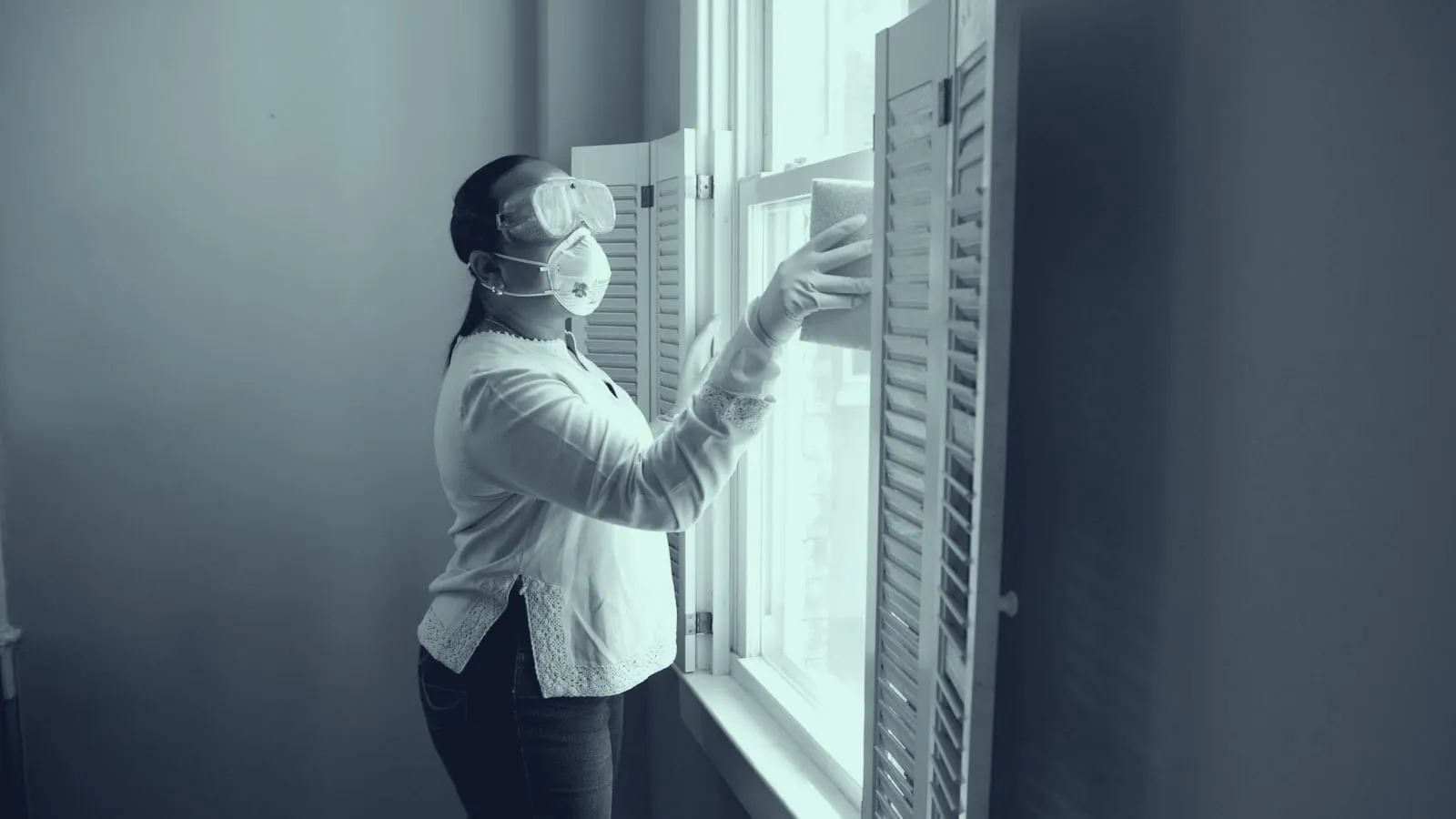 Professional cleaning team working in a bright modern space