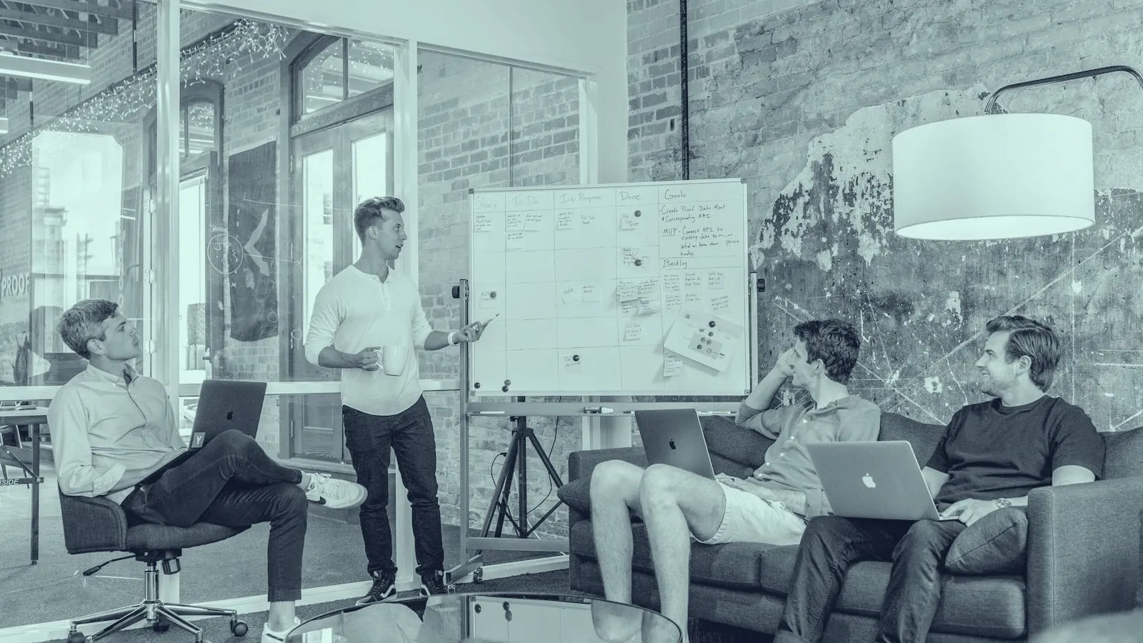 Business consultant presenting strategy to a client in a modern office